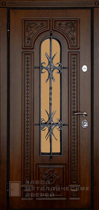 Фото «Дверь с ковкой №13»  в Лобне